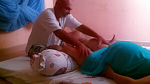 Pregnant woman getting leg massage